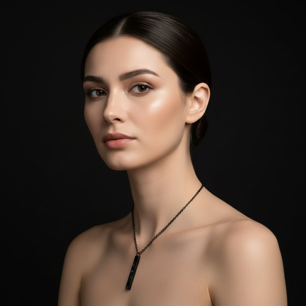 Woman wearing a necklace against a black background Hadi Craft USA