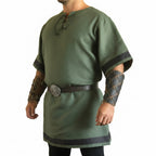 viking warrior costume featuring a green medieval shirt with leather accents