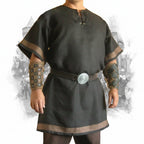 Medieval Viking wear viking warrior costume featuring a classic tunic and arm armor.