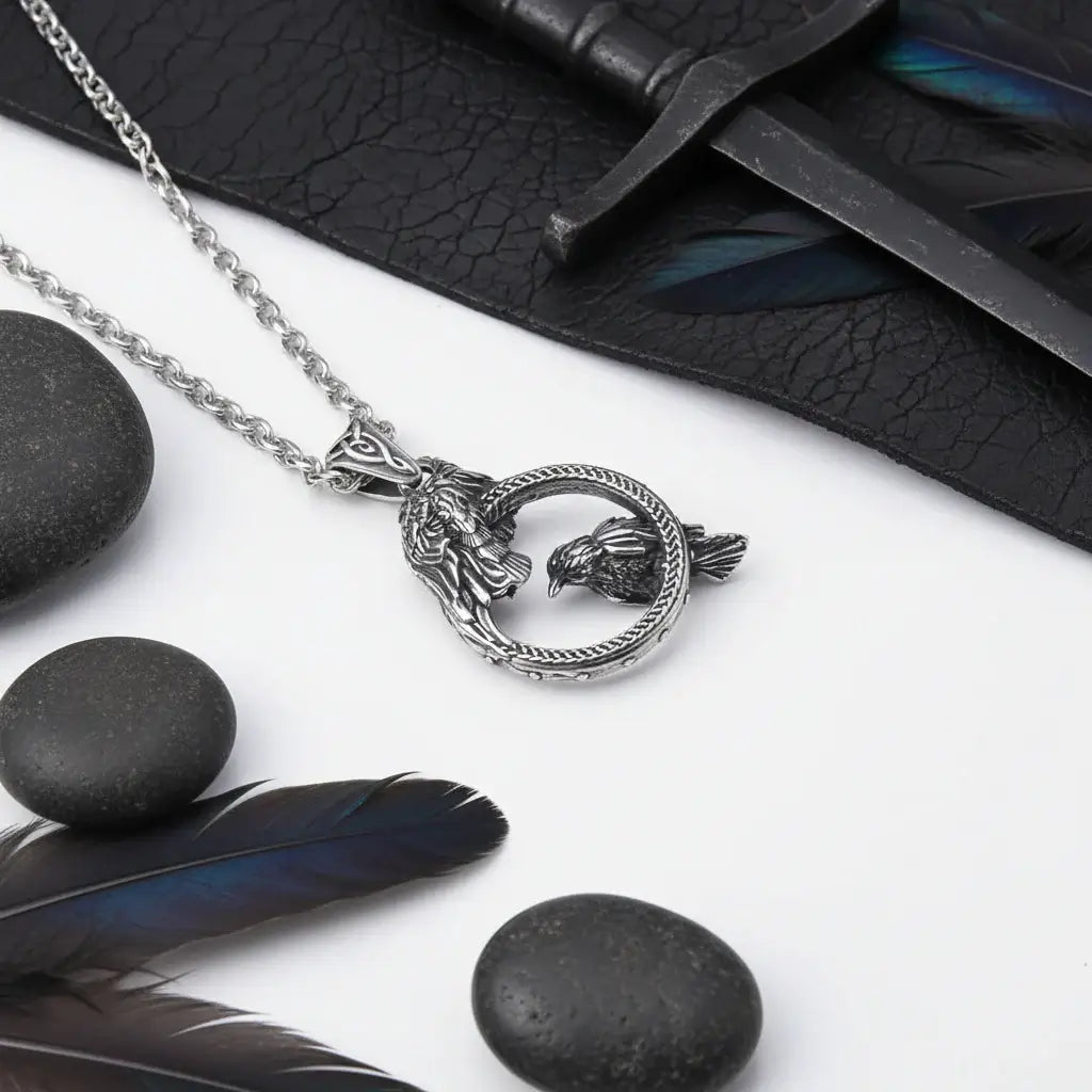 Odin raven pendant necklace featuring Huginn and Muninn design on a stainless steel chain with black stones and feathers.