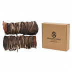 Medieval leather arm guards featuring adjustable ties and vintage design.