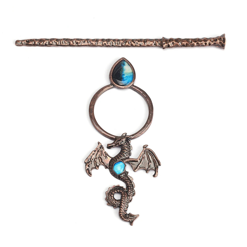 viking dragon hair clip with blue gemstone and metal design