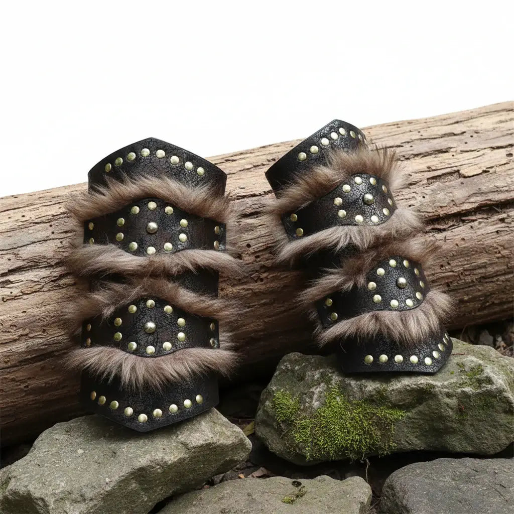 Viking leather bracers for cosplay featuring faux fur and riveted details, perfect for LARP and Halloween costumes.