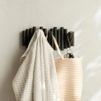 Wall-mounted coat rack with retractable pegs Retractable - Hadi Craft