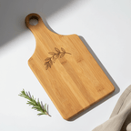 Alt Tag: Hadi Craft USA 13 1/2" x 7" Bamboo Paddle Shaped Cutting Board with Custom Personalized Engraving, wooden cutting board, engraved handmade