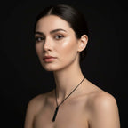 Woman wearing a necklace against a black background Hadi Craft USA