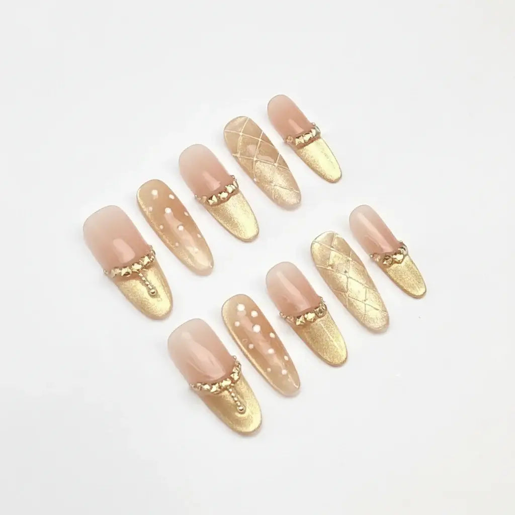 Alt Tag: Hadi Craft USA Luxury Handmade Cat-Eye Press-On Nails for Elegant Style, nude and gold handmade nails, reusable press-on nails USA