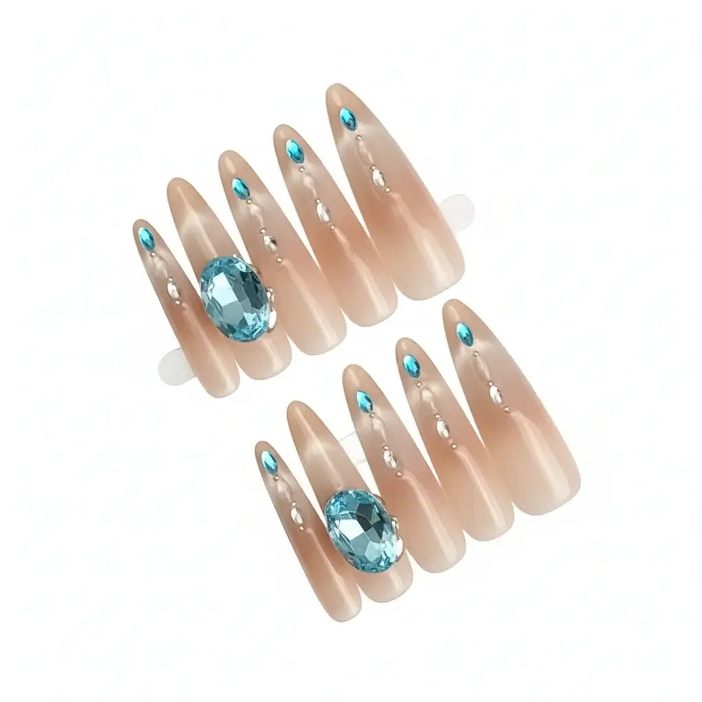 Luxury Handmade Cat-Eye Press-On Nails for Elegant Style by Hadi Craft USA, nude stiletto nails with blue gemstone accents, handmade, personalized