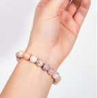 Repair My Heart - The Peruvian Pink Opal Bracelet on wrist, handmade beaded bracelet by Hadi Craft USA, pink opal jewelry