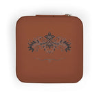 compact pink jewelry travel organizer with floral design, perfect for storing rings and earrings.
