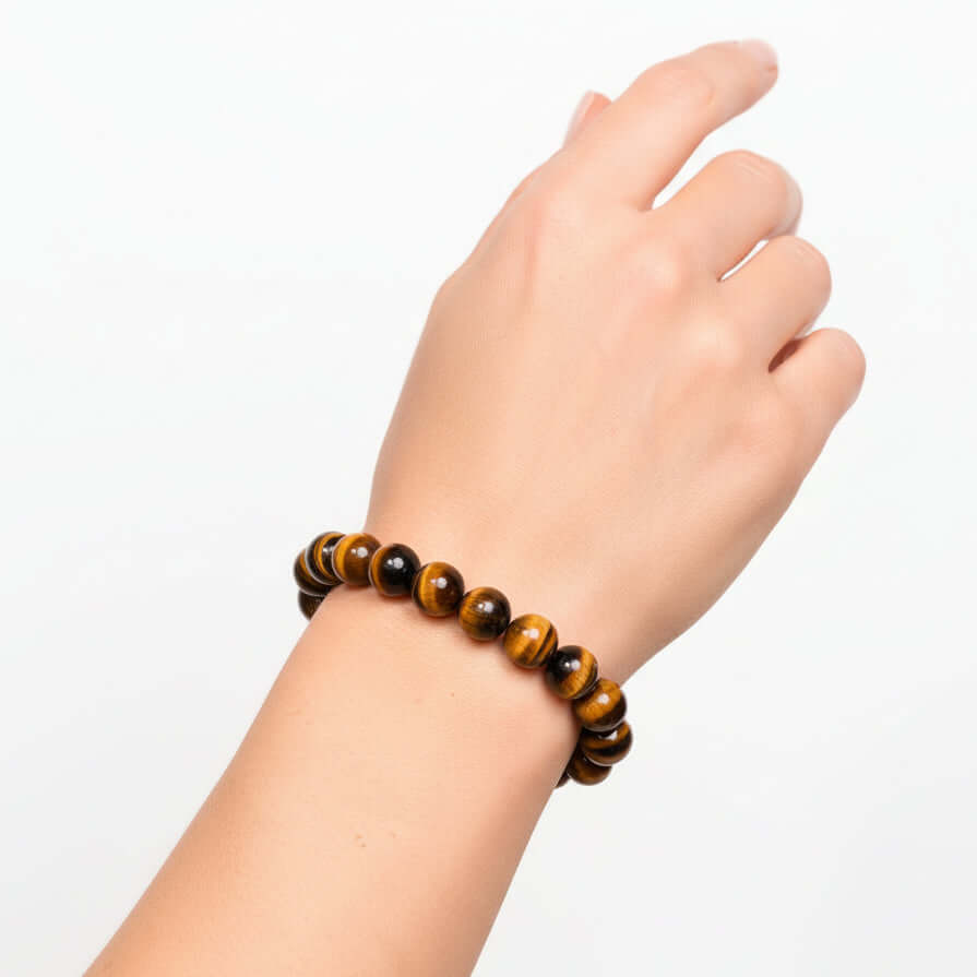 Alt Tag: Built to Win – 7A Grade Tiger’s Eye Bracelet by Hadi Craft USA on wrist, handmade beaded bracelet, tiger’s eye jewelry
